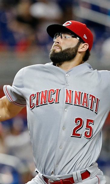Reed wins in 1st major league start, Reds top Marlins 4-2